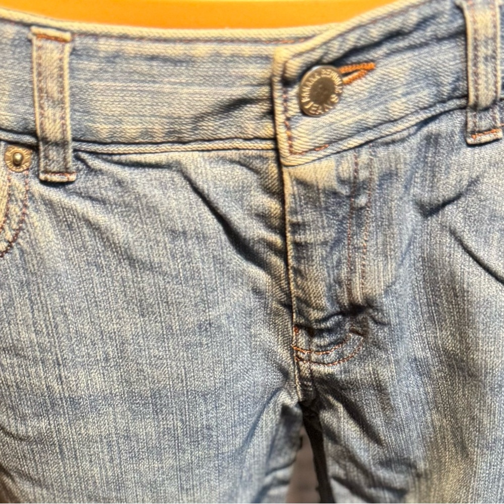 Blue Boyfriend Jeans with Faded Denim and Contrasting Stitching